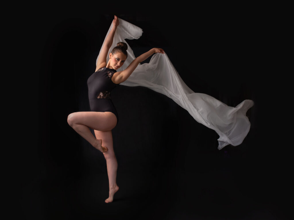 senior girl dancer in a creative in-home photo shoot in Minnesota