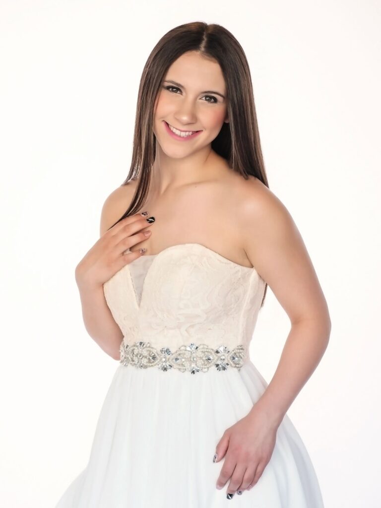 girl wearing a fun dress in her in-home studio session