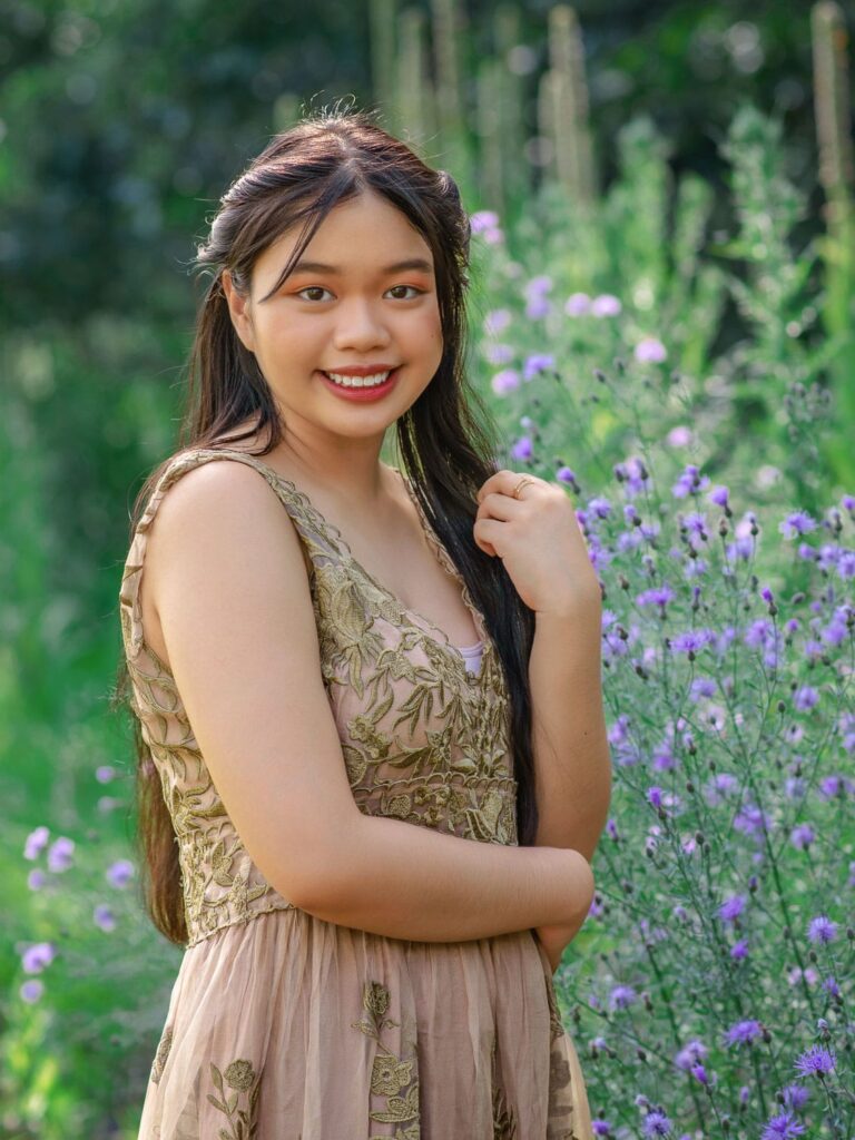 senior girl in wild flower field in Lakeville Minnesota