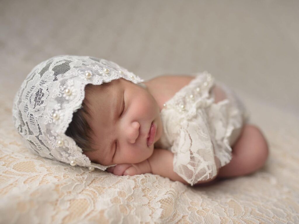 newborn-photo-in-a white-dress